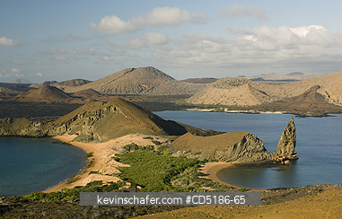 GALAPAGOS: Bartolome Island with James, (Santiago), behind, Galapagos Islands.