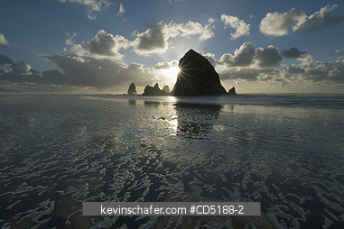 OREGON, US: Sunset over Haystack Rock, Cannon Beach OREGON COAST Oregon USA