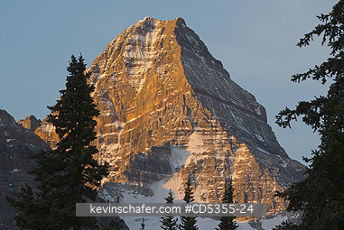 CANADA, BRITISH COLUMBIA: Sunrise on Mt. Assiniboine from Magog Lake, Mt. Assiniboine Provincial Park, British Columbia, Canada SEPTEMBER