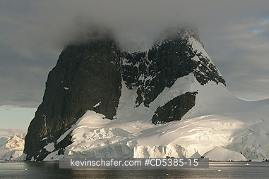 ANTARCTIC, SCENIC: Sunset on peaks of Lemaire Channel, Antarctic Peninsula, Antarctica