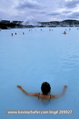 ICELAND, SCENIC: Blue Lagoon near Revkiavik, bathers in silica-rich thermal pool.